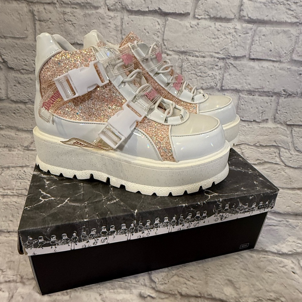 Brand new Demonia Slacker -50 white and pink holographic platform size 11